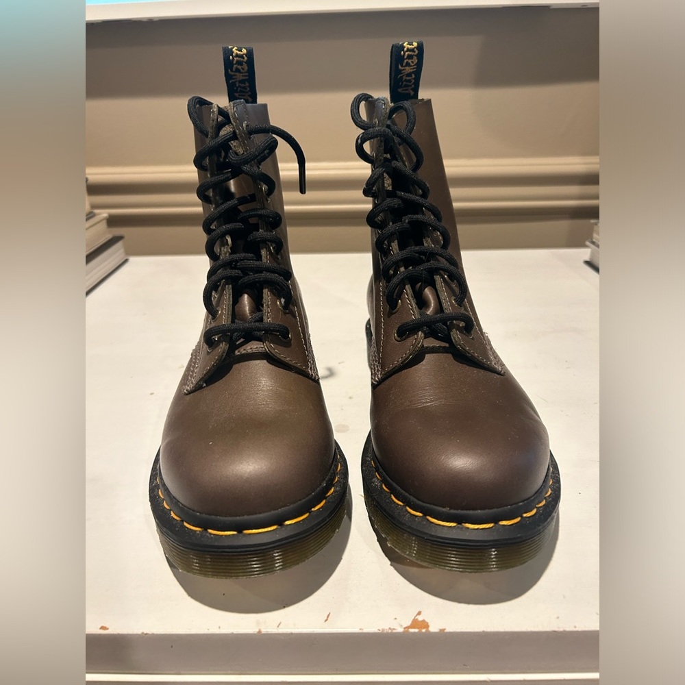 Dr. martens olive green boots. Never worn. Size US 7